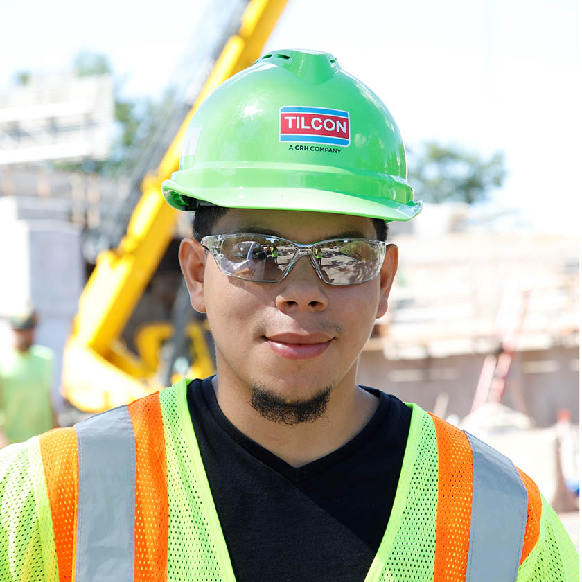 headshot of employee wearing safety gear