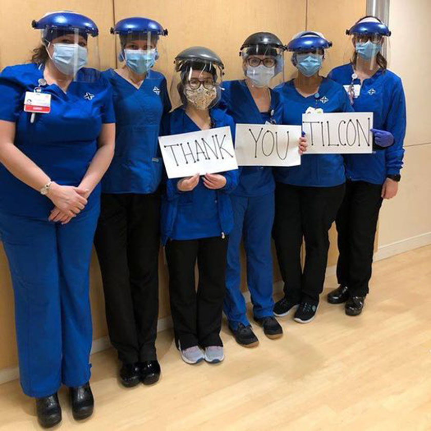 hospital employees holding thank you sign
