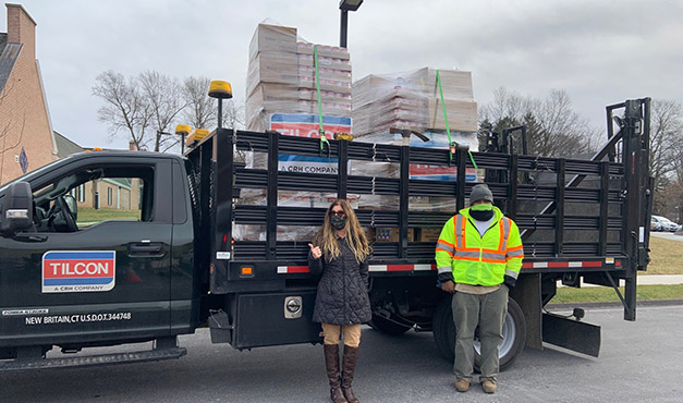 people standing in front of truck