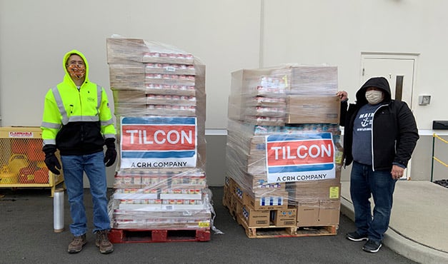 people standing next to food donation